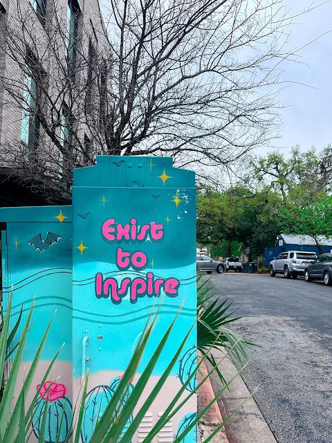 Exist to Inspire mural